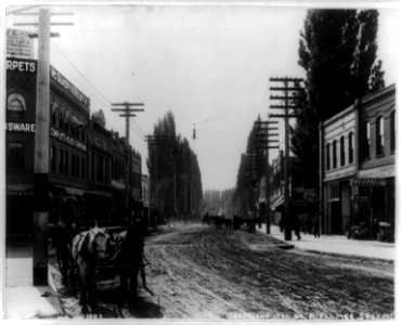 Street scene in Lewiston, Idaho, including stores and horse-drawn wagons LCCN89711645 photo