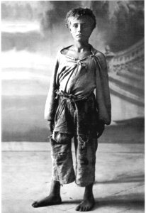Street neapolitan boy from kindergarten ship Caracciolo - In rags
