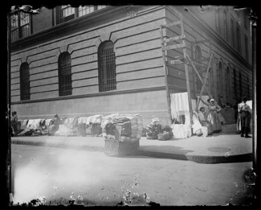 Street stands in Ludlow Street in front of public school, a dry-goods store that pays no rent LCCN2015647196
