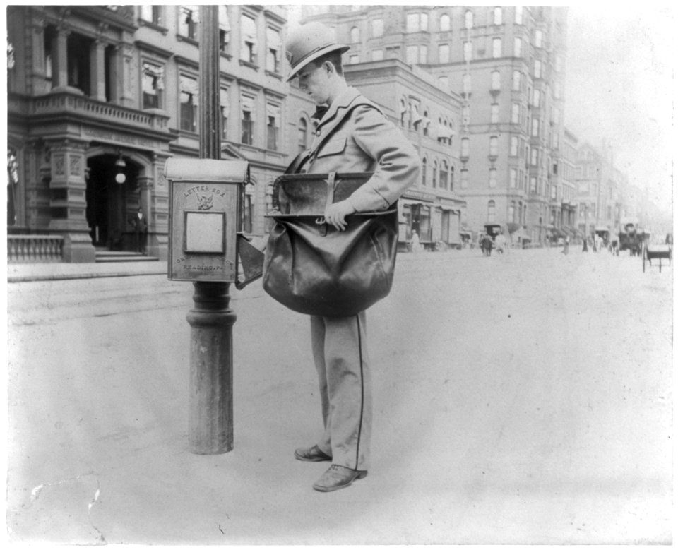 Street types of New York City- Postman at letter box LCCN2002699105