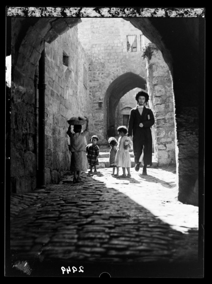 Streets in Old City. Jerusalem, Street of Old Homes. Jewish youth with curls in foreground LOC matpc.15161