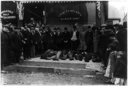 Strikers at Roosevelt. Wounded awaiting ambulance LCCN2013647203 photo