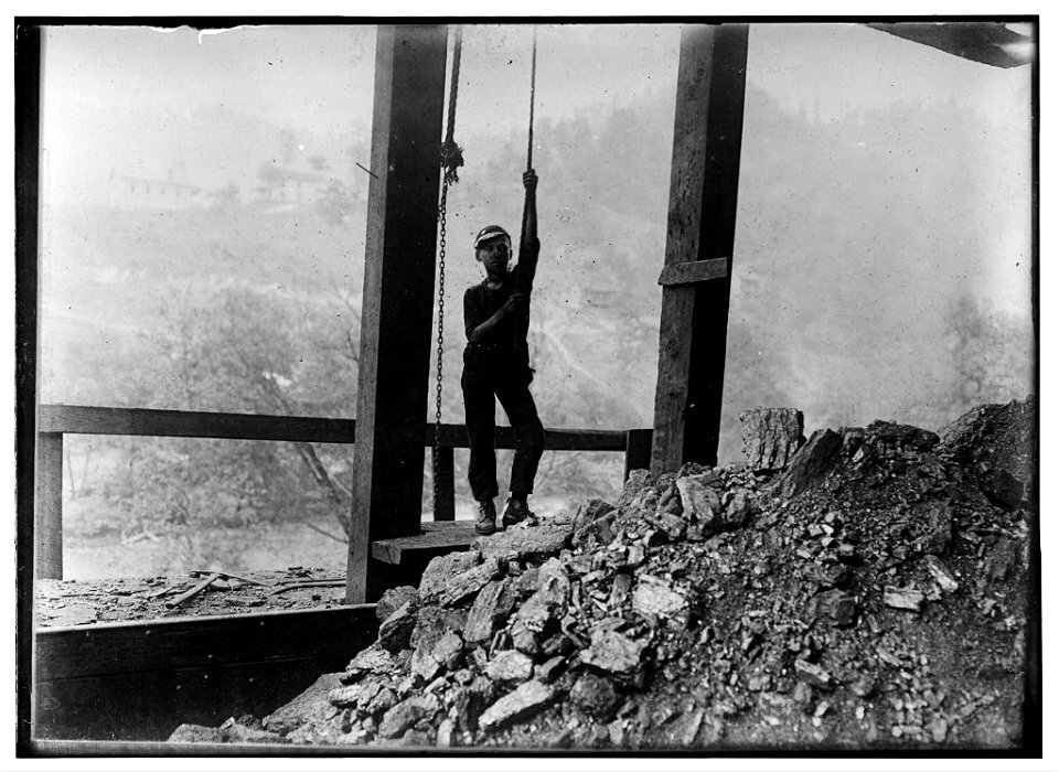 Subject -Coal. -70 Welch Mining Co., Welch W. Va. Boy running 'trip rope' at tipple. Overgrown, but looked 13 yrs. old. Worked 10 hours a day. LOC nclc.05353
