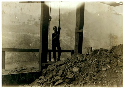 Subject -Coal. -70 Welch Mining Co., Welch W. Va. Boy running 'trip rope' at tipple. Overgrown, but looked 13 yrs. old. Worked 10 hours a day. LOC nclc.05353