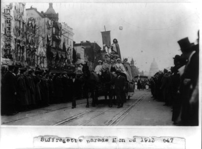 Suffragette parade on Pennsylvania Ave., Washington, D.C. - women on wagon LCCN2001706136