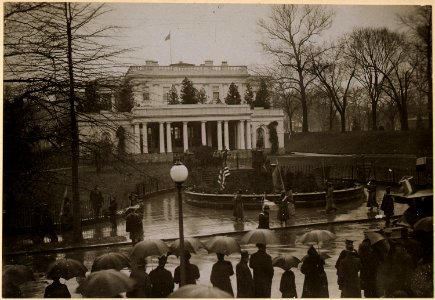 Suffragists picket the White House. Photo shows suffragists, carrying banner, on picket duty . . . - NARA - 533771 photo
