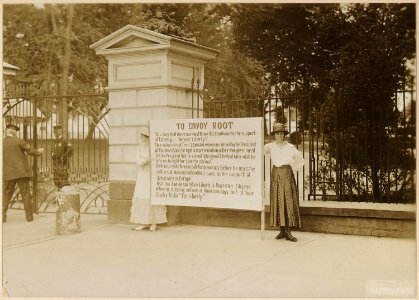 Suffragists picket White House. Banner posted in front of the White House, Washington . . . - NARA - 533782 photo