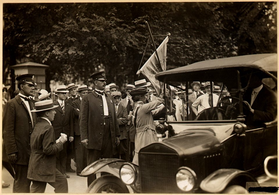 Suffragists arrested for picketing the White House. Photo shows suffragist arrested in front . . . - NARA - 533776