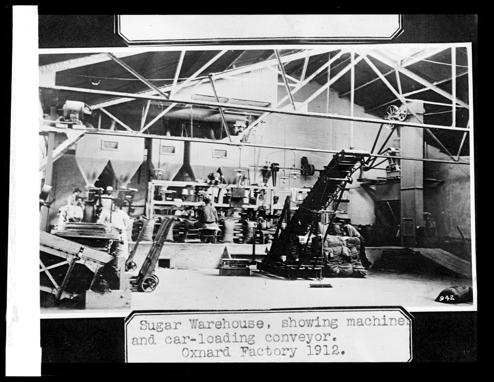 Sugar warehouse, showing machines and car-loading conveyer LCCN2016824507
