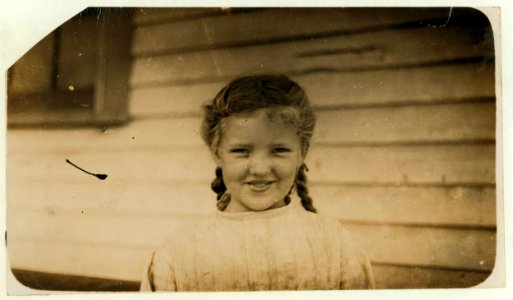 Sula Bedford, nine years old. Lives in Tupelo, Miss. Mother said, 'Just as soon as she's 12, her father wants her to learn to weave. She could spin now, (heaps of 'em smaller'n she is does) LOC nclc.02045
