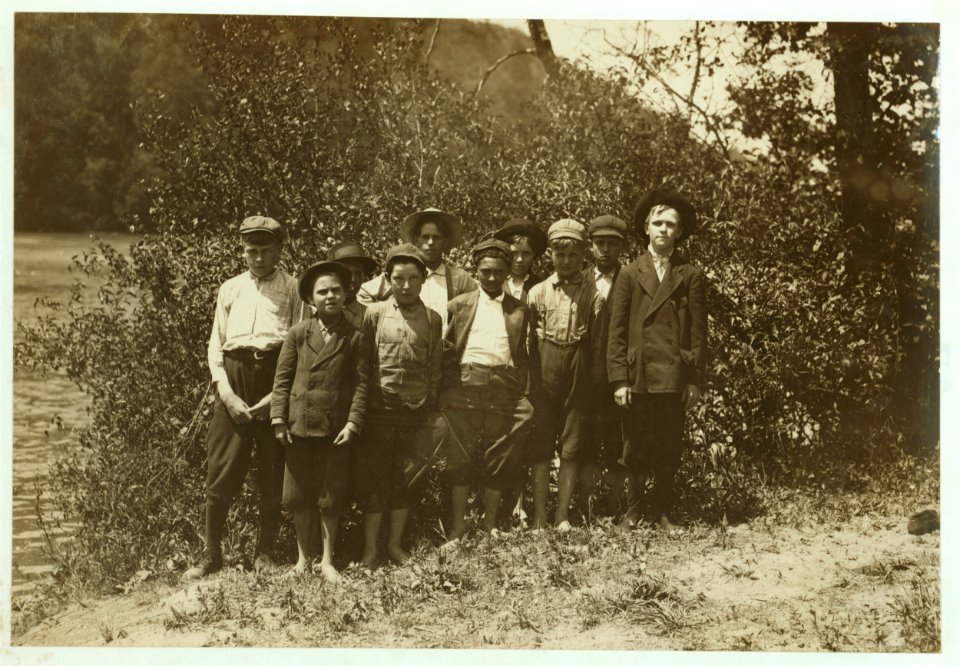 Sunday morning by the river. All of these boys work in Washington Cotton Mills, Fries, Va. Smallest boy doffs. Asked him his age, and he said, after hesitation, 'I don't know.' One of his LOC nclc.02144