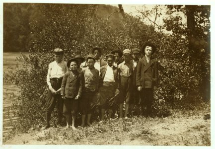 Sunday morning by the river. All of these boys work in Washington Cotton Mills, Fries, Va. Smallest boy doffs. Asked him his age, and he said, after hesitation, 'I don't know.' One of his LOC nclc.02144