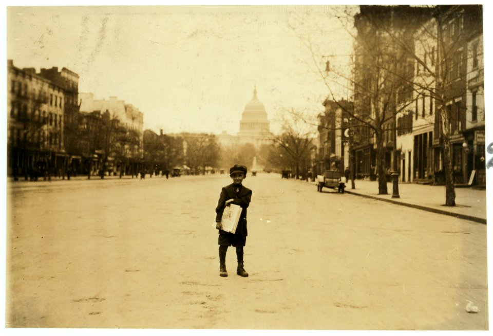Sunday. 7 yr. old news-boy, without a badge, who tried to 'short-change' me when he sold me a paper. 'He can rustle de poipers'another boy said. William Parralla, 313 Second St., S.W.,. LOC cph.3b38483