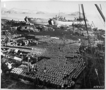 Supplies and equipment are also evacuated from the onslaught of the Communist Forces bearing down on Hungnam, Korea. - NARA - 531394