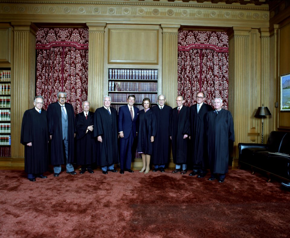 Supreme Court Justices pose with President Ronald Reagan in the Supreme Court Conference Room
