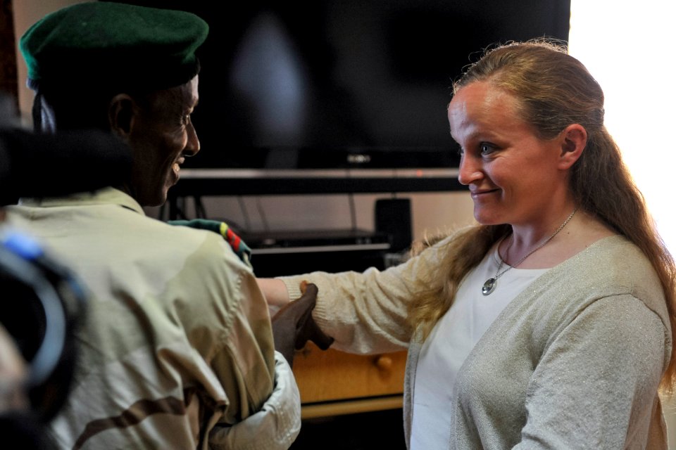 Survivors from 2006 helicopter crash meet with Djiboutian rescuers 140324-N-LE393-213