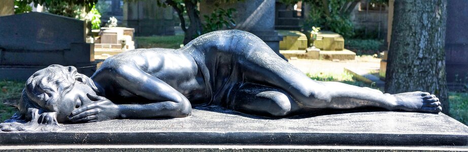 Reclining lady grieving photo