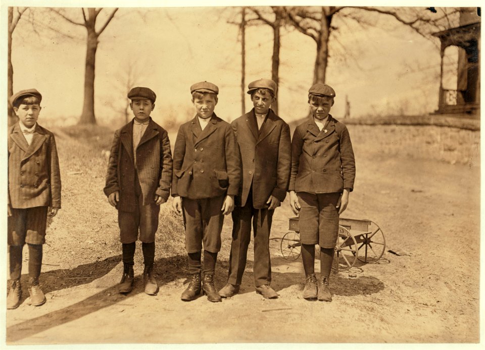 Sweepers and doffers in Royal Mill, River Point, R.I. Boy on right hand end, Frank Jetro has been in mill 3 years. Next Jos. Jetro, nearly 3 years. Next Manuel Ray; 2 years. Next Jo. Jolian; LOC nclc.01685