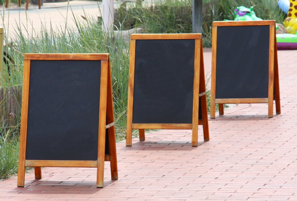 Display device wall advertising customer stopper
