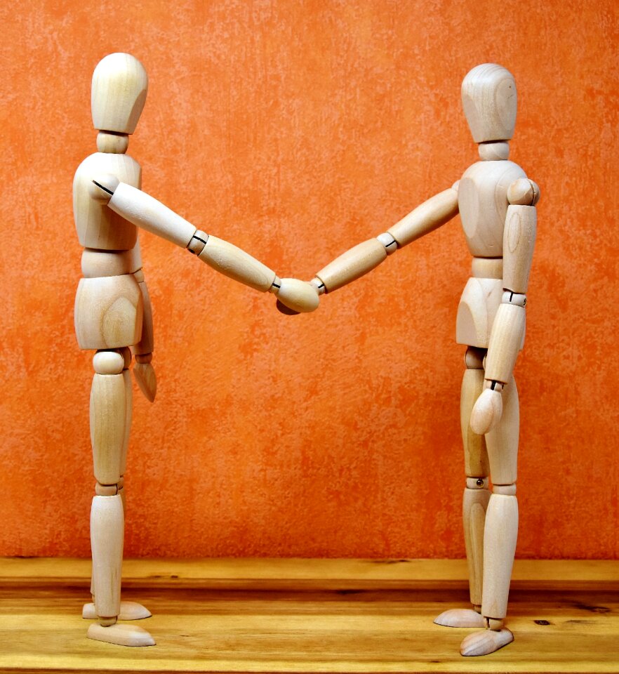 Shaking hands friendship welcome