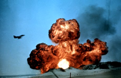 TA-4 Skyhawk flies ovr bomb explosion in 1984