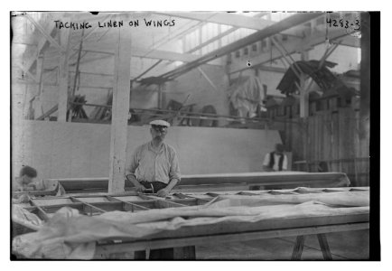 Tacking linen on wings LCCN2014705168