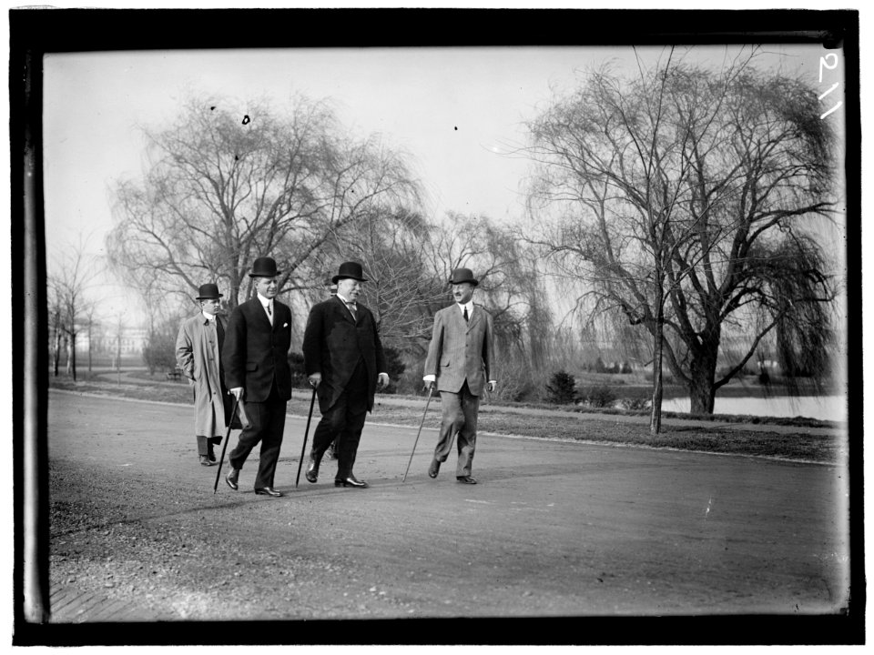 TAFT, WILLIAM HOWARD. OUT FOR A STROLL WITH ARCHIBALD BUTT, MILITARY AIDE, AND CHARLES DEWEY HILLES, SECRETARY TO THE PRESIDENT LCCN2016863235