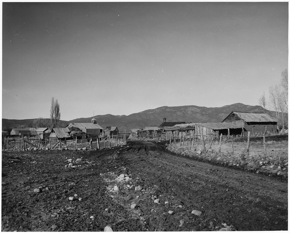 Taos County, New Mexico. View of Llano San Juan. Like most Taos County roads, when wet transportat . . . - NARA - 521858