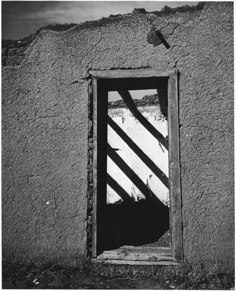 Taos County, New Mexico. The semi-abstract patterns of details of abandoned adobe buildings that ha . . . - NARA - 521874
