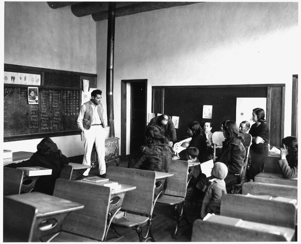 Taos County, New Mexico. Andres Hernandez, Assistant Director of the Taos County Project, meets wit . . . - NARA - 521837