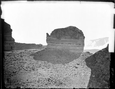 Teapot Rock, near Green River Station. Sweetwater County, Wyoming. Small figure of man at foot of spout gives an... - NARA - 516618 photo