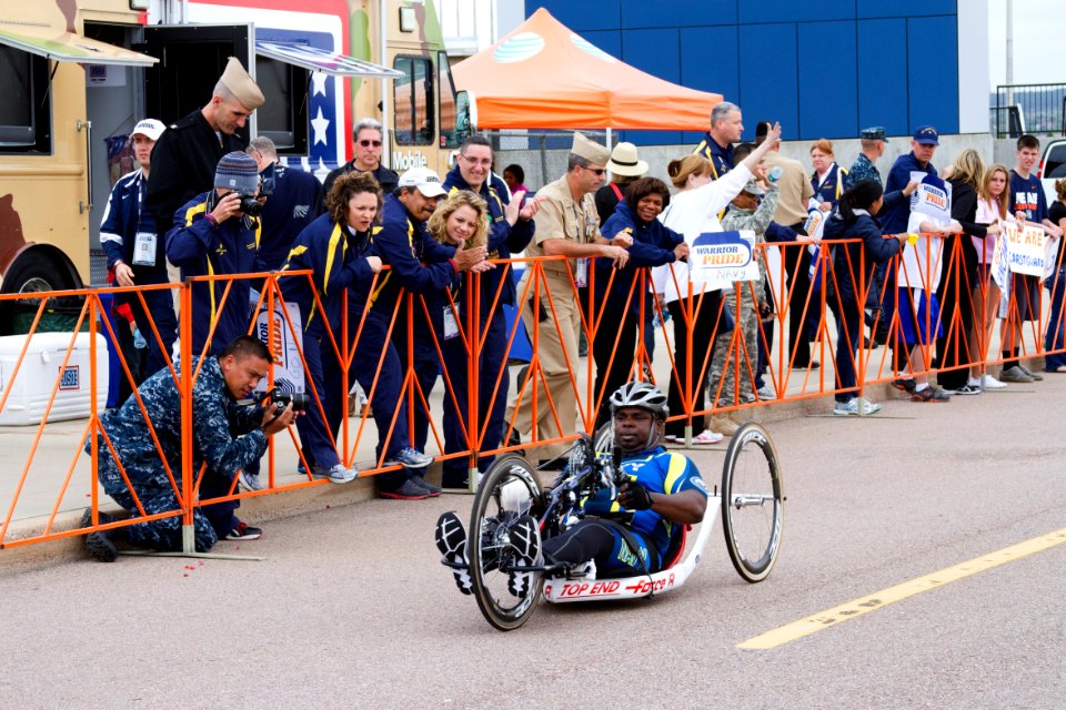 Team Navy-Coast Guard cheers cyclist teammate 120501-N-AN499-127