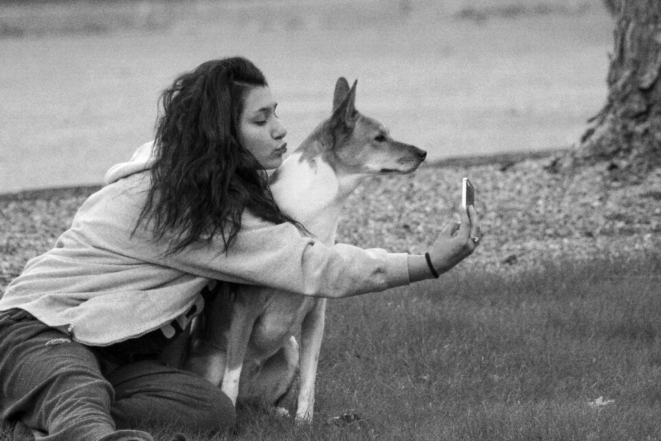 Woman woman and pet selfie