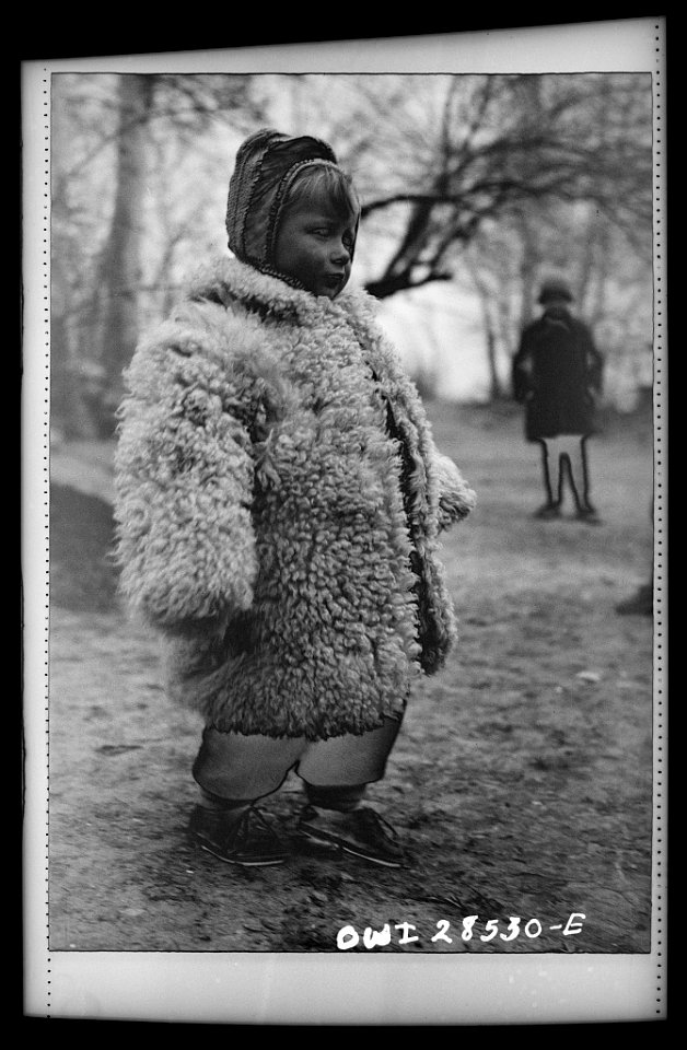 Teheran, Iran. Little Polish girl in a big sheepskin coat who is at an evacuation camp operated by the Red Cross8d29643v