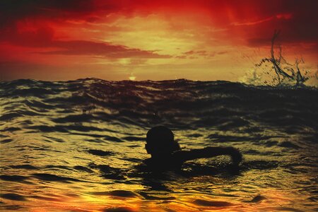 Child swimming sea photo