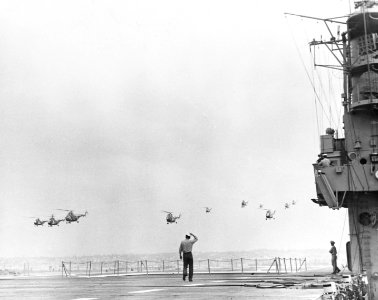 Ten HO4S of HS-4 approach USS Badoeng Strait (CVE-116) in 1954
