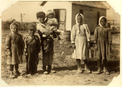 The 8 and 10 yr. old children here are working beets on a farm near Sterling, Colo, from 5-00 A.M. to 7-00 P.M. on rush days. Father said, 'We have to get done.') LOC cph.3a01110