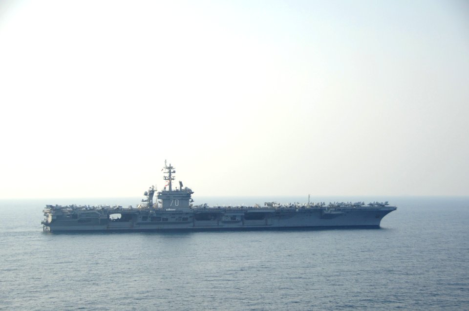 The aircraft carrier USS Carl Vinson (CVN 70) relieves the aircraft carrier USS George H.W. Bush (CVN 77), not shown, in the Persian Gulf Oct. 18, 2014, during Inherent Resolve 141018-N-MU440-025