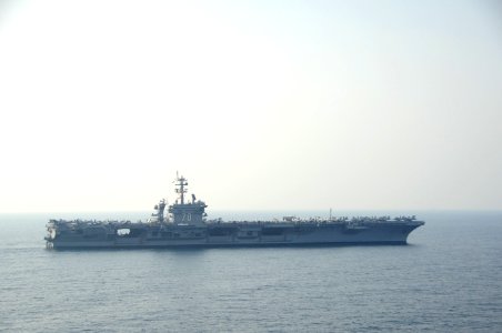 The aircraft carrier USS Carl Vinson (CVN 70) relieves the aircraft carrier USS George H.W. Bush (CVN 77), not shown, in the Persian Gulf Oct. 18, 2014, during Inherent Resolve 141018-N-MU440-025