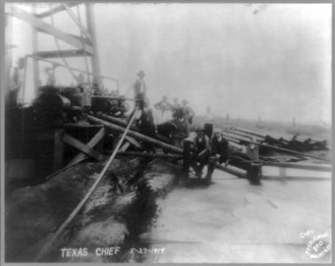 Texas oil fields)- Texas Chief, 5-27-19; (men sitting near pumps LCCN2016648029