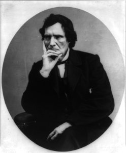 Thaddeus Stevens, 1792-1868, half length portrait, seated, facing left; hand under chin LCCN2005686648