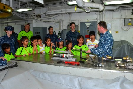 Thai students tour USS Frank Cable 140328-N-WC566-010