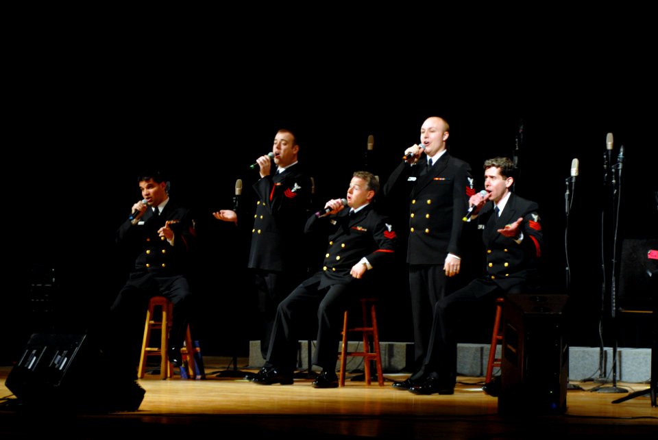 The Sideboys of the Sea Chanters Chorus during their tour concert in the Ft. Stockton High School auditorium (090316-N-0773H-004)