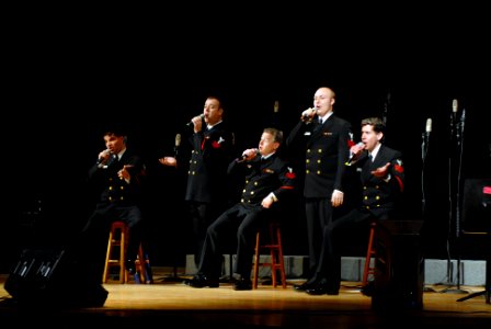 The Sideboys of the Sea Chanters Chorus during their tour concert in the Ft. Stockton High School auditorium (090316-N-0773H-004)