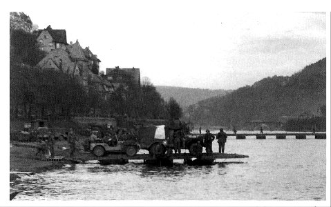 The 289th Engineer Combat Battalion ferrying troops and vehicles over the Neckar River at Heidelberg