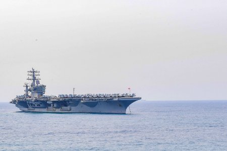 The aircraft carrier USS Nimitz (CVN 68) anchors off the coast of India for Malabar 2017