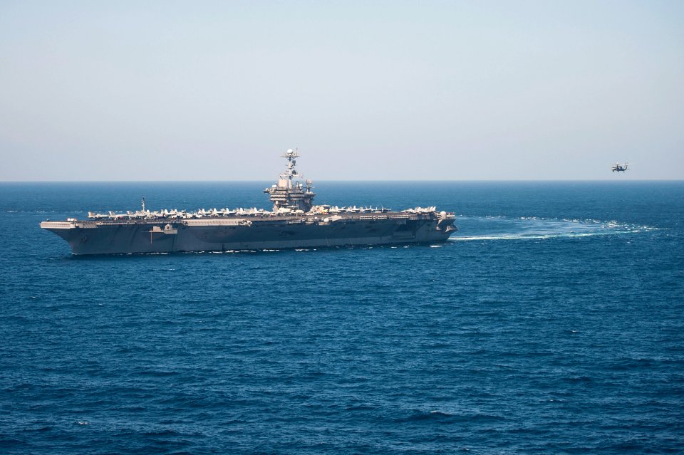 The aircraft carrier USS Harry S. Truman (CVN 75) travels in the Gulf of Oman March 18, 2014 140318-N-ZG705-224