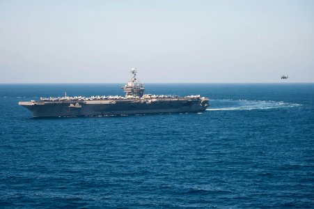 The aircraft carrier USS Harry S. Truman (CVN 75) travels in the Gulf of Oman March 18, 2014 140318-N-ZG705-224