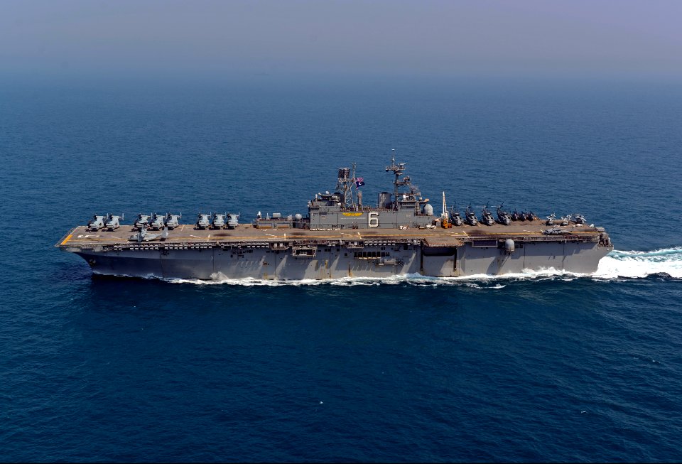 The amphibious assault ship USS Bonhomme Richard (LHD 6) transits the East China Sea during a photo exercise March 27, 2014 140327-N-BJ178-293