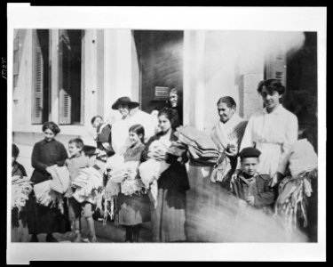The American sewing circle in Athens A group of Greek women who work in the sewing rooms established by the American Red Cross in the Greek capital. LCCN2010648477